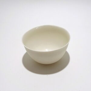 Viewed from a slight angle above, a Very Fine White Porcelain bowl, only glazed on inside, with the outside unglazed and available in Woburn Mosaic, contemporary art gallery