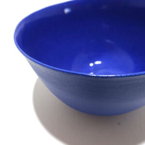 Close up View from a slight angle above, a Very Fine Dark Cornflower Blue Porcelain bowl, only glazed on inside, with the outside unglazed and available in Woburn Mosaic, contemporary art gallery
