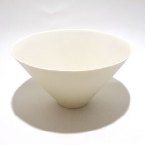 Viewed from a slight angle above, a very fine white conical porcelain bowl, glazed on the inside with outside unglazed, available in Woburn Mosaic, contemporary art gallery