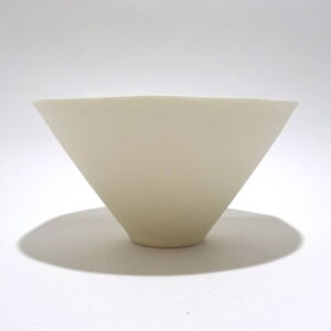 Viewed from the side, a very fine white conical porcelain bowl, glazed on the inside with outside unglazed, available in Woburn Mosaic, contemporary art gallery