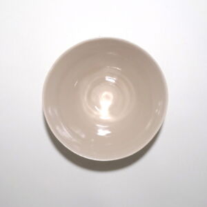 Viewed from above, a very fine medium soft pink conical porcelain bowl, glazed on the inside with outside unglazed, available in Woburn Mosaic, contemporary art gallery