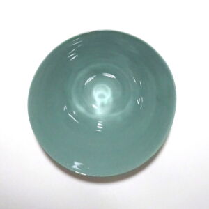 Viewed from above, a very fine medium, green conical earthenware bowl, glazed on the inside with outside unglazed, available in Woburn Mosaic, contemporary art gallery