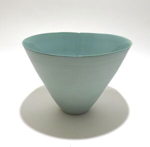 Viewed from a slight angle above, a very fine medium, green conical earthenware bowl, glazed on the inside with outside unglazed, available in Woburn Mosaic, contemporary art gallery