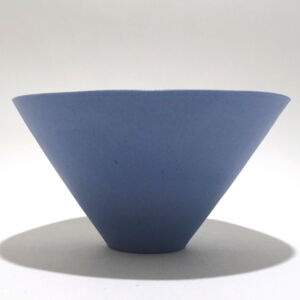 Viewed from the side, a very fine , small, lavender conical porcelain bowl, glazed on the inside with outside unglazed, available in Woburn Mosaic, contemporary art gallery
