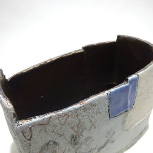 Close Up Above Craig Underhill Crosses and Blue Window