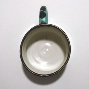 Above Richard Baxter Green Mug