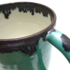 Close Up Richard Baxter Green Mug